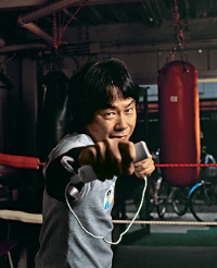 Shigeru Miyamoto playing Wii Sports Boxing