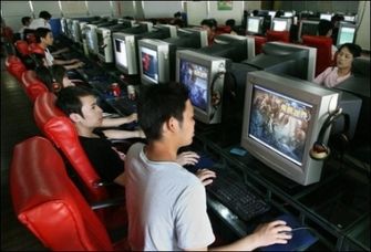 Chinese MMO players play at an internet cafe