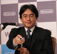 Nintendo President Satoru Iwata plays with Wii Remote