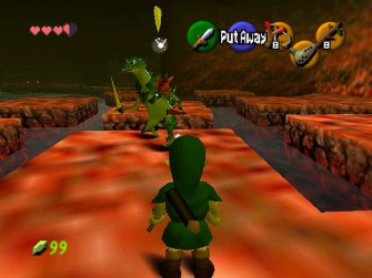 Link fights Lizalfos in a dungeon (Zelda: Ocarina of Time Screenshot)