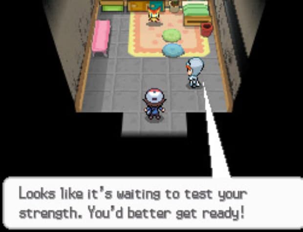 Victini waits to battle at lighthouse basement in Liberty Garden. Pokemon Black and White screenshot