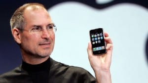 Steve Jobs Holds the Revolutionary iPhone