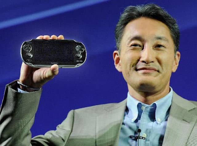 Kaz Hirai Sony President holding PlayStation Vita
